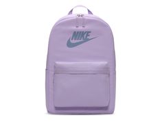 Show off your athletic style with the Nike® Heritage Backpack this year. This classic style backpack has a large main compartment with laptop pocket, and additional side pockets for added storage. The iconic Nike® branding details will make you a standout in the hallway just like you're a standout on the court! Synthetic upper, Adjustable padded shoulder straps,18 inches H x 11 inches W x 5 inches D, Padded back, Large zippered compartment with laptop pocket, Two side zip pockets, Front zip pocket, Top loop handle, Nike® branding elements | Nike Heritage Backpack in Lilac Bloom Nike Heritage Backpack, Lunch Box Backpack, Branding Elements, Nike Branding, Athletic Style, Heritage Backpack, Unisex Accessories, Pocket Top, Laptop Pocket