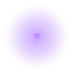 a purple circle with a heart in the center on a white background that appears to be blurry