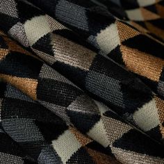 black, brown and white checkered fabric