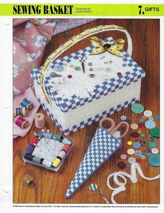 an advertisement for sewing basket with scissors and other items