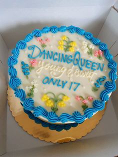 a birthday cake in a box with the words dancing queen on it's frosting