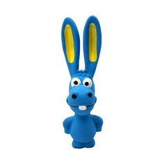 a blue stuffed animal with yellow ears and two eyes, standing in front of a white background