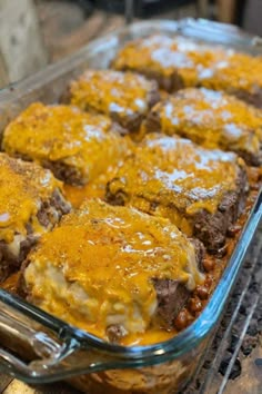 a casserole dish with meat and cheese on top