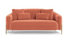 an orange couch with four pillows on it's back and two arms, sitting against a white background