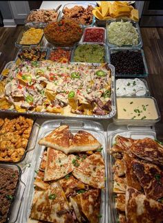 a table filled with lots of different types of food