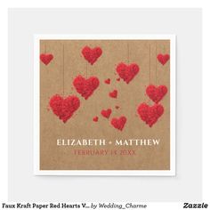 a brown card with red hearts hanging from strings and the words elizabeth and mathew on it