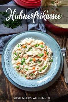 a bowl of chicken alfredo with peas and carrots next to a plate of mashed potatoes