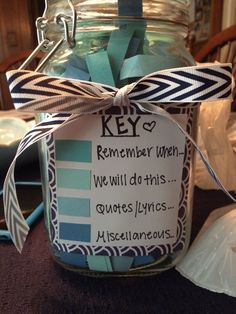 a jar filled with blue and white items