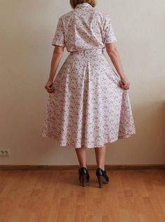 "Vintage Dress Floral Flower Print Short Sleeve Button up Long Midi Summer Romantic Sundress Button Down Ivory Pink Green Boho Shown on model M Measurements(lying flat): Length: 48\"/ 122 cm Shoulders:16.5\"/ 42 cm Sleeve 8.5\"/ 22 cm Bust:19.5\"/ 49 cm Waist:14 2/8\"/ 36 cm Condition: excellent Vintage Condition Please check measurements to insure a proper fit. Remember to allow yourself some extra room for movement. You can compare these with something from your closet that fits you well. Plea Button-up Cotton Floral Print Dress, Cotton Floral Print Button-up Dress, Cotton Button-up Dress With Floral Print, Cream Buttoned Dress For Daywear, Cream Button Dress For Daywear, White Button-up Feminine Dress, White Feminine Button-up Dress, White Button-up Shirt Dress With Floral Print, Short Sleeve Dress With Button Back For Daywear