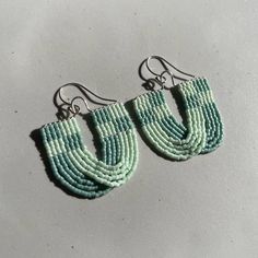 These fun, Mint and Seafoam checkered beaded earrings are hand threaded using 11/0 Miyuki Delica beads and Nymo thread. They are also made with sterling silver wire and earring hooks. These are about 6 cm long with the earring hooks and 3.5 cm wide. All orders include a polishing cloth and a muslin jewelry bag. Earrings are made to order so it can take up to a week or so to make and have shipped out to you. Thank you so much for your patience! All of my art and jewelry are made with so much love Unique Sterling Silver Beaded Earrings, Green Beaded Earrings With Silver Beads As Gift, Handmade Sterling Silver Beads For Jewelry Making, Handmade Sterling Silver Beads For Gift, Colorful Round Beaded Sterling Silver Earrings, Colorful Beaded Earrings In Sterling Silver, Colorful Sterling Silver Beaded Earrings, Sterling Silver Beaded Earrings With Colorful Beads, Sterling Silver Earrings With Tiny Round Beads