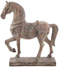 a wooden statue of a horse on a white background