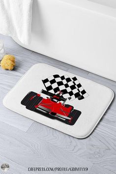 a bath mat with a racing car on it