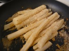 french fries frying in a skillet on the stove