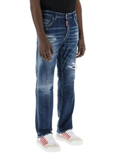 These DSQUARED2 642 five-pocket jeans are the ultimate blend of cool and comfort. With a dark destroyed wash and a regular, tapered cut, they're perfect for any casual occasion. Plus, the signature band-aid patch on the back pocket adds a playful touch to your everyday style. Made of stretch cotton denim Hidden button closure and belt loops Features rips and abrasions on the legs Regular fit with a tapered cut Diaper Backpack, Pocket Jeans, Everyday Style, Womens Backpack, Stretch Cotton, Size Clothing, Everyday Fashion, Bags Women, Fashion Bags