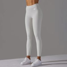 The Shape Leggings are crafted with a high-compression fabric that provides targeted support to key muscle groups, enhancing your natural curves and offering a sculpted silhouette. Experience a flattering fit that boosts your confidence during any workout. ✔️High-stretch fabric✔️Raised contouring to accentuate your waist and to define the lower glutes✔️Super soft & lightweight seamless fabric✔️Reinforced scrunch bum stretch stitch✔️Seamless White Compressive Elastane Leggings, White 4-way Stretch Sports Leggings, Tight White Moisture-wicking Leggings, White High-waist Elastane Leggings, White High Stretch Full-length Leggings, Compression Fabric, Natural Curves, Muscle Groups, Stretch Fabric