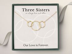 "3 Ring sister necklace, Sister necklace set for 3, Big Sister Middle Sister Little Sister necklace, Three Sisters gifts, Sister birthday They say two's company and three's a crowd, but that isn't the case when it comes to you and your two sisters. With multiple versions available (as seen below), you are sure to find the perfect gift for you and your sisters. Beautifully packaged, this gift is ready to give right away! With option V.1 you will receive a set of 3 two ring necklaces - one for eac Sister Necklace Set, Necklace Sister, Dog Memorial Jewelry, Gifts Sister, Pet Memorial Necklace, Middle Sister, Moonstone Pendant Necklace, Sister Necklace, Gold Vermeil Jewelry