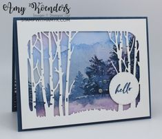 a handmade card with watercolor trees on it