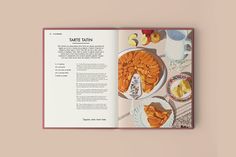 an open book with pictures of food on it