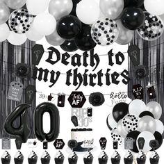 a black and white party theme with balloons