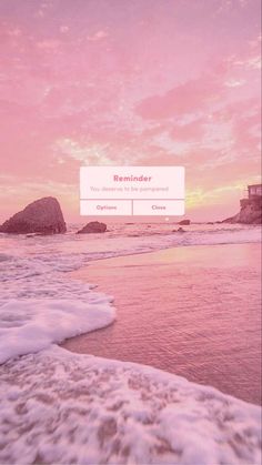 an image of the beach with waves coming in from the water and a sign that reads reminder