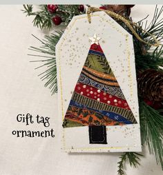 an ornament with a christmas tree on it