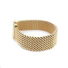 Wide Mesh Bracelet in 18K Yellow Gold. The bracelet is 8.5" long, 20mm wide, and weighs 58.69 grams. Stamped 750 BREV. Luxury Gold-tone Gold Plated Bracelets, Gold-tone Solid Link Gold-plated Bracelet, Luxury Gold-tone Metal Bracelet, Luxury Vintage Gold-tone Bracelets, Luxury Gold-tone Brass Bracelet, Mesh Bracelet, Earring Necklace, Ring Necklace, Precious Metals