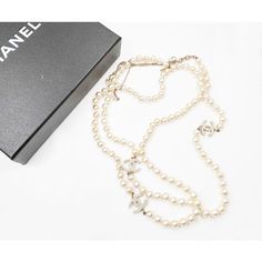 This is part of Chairish’s Costume Jewelry assortment.  Chanel 3 Gold CC Pearl Faux Fresh Water Pearl Long Necklace   * Marked 12 * Made in France * Comes with the original box   -It is approximately 46". -The cc pendant is approximately 0.55″ x 0.9″. -Wear it as a long necklace or double it as a short necklace -Some of the pearls have blemishes.  -In a good condition Luxury Formal Pearl Necklace With Chain, Luxury Long Necklace For Party, Luxury Long Pearl Necklace, Pearl Long Necklace, Fresh Water Pearl, Accessories Jewelry Necklace, Short Necklace, Long Necklace, Costume Jewelry