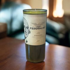 a candle sitting on top of a wooden table