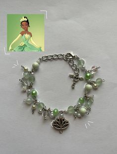 this bracelet was inspired from the movie Princess and the Frog :) it's supposed to look like tianas green dress that she wore, I tried to include all the colors! Here's a few things of how to take care of this bracelet, it's super simple * please don't get this bracelet wet, like putting water on it or any other liquid * also handle it gently when putting it on and off your wrist :) Princess And The Frog Bracelet, Adjustable Whimsical Green Bracelets, Whimsical Adjustable Green Bracelets, Whimsical Green Beaded Bracelets, Princesa Tiana, Princess Tiana, Green Dress, All The Colors, That Look