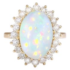 7.15 Carat Natural Opal 14 Karat Yellow Gold Diamond Ring Stamped: 14K Yellow Gold Total Ring Weight: 5.9 Grams Opal Weight is 5.70 Carat (Measures: 15.00x10.00 mm) Diamond Weight is 1.45 Carat Color: F-G, Clarity: VS2-SI1 Face Measures: 20.35x17.00 mm Sku: [704119W] Opal And Diamond Ring, Radiant Ring, Opal Diamond Ring, Yellow Gold Diamond Ring, Jewelry Accessories Ideas, Gold Diamond Ring, La Face, Lovely Ring, Gold Diamond Rings