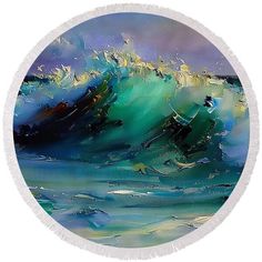 a round beach towel featuring an ocean wave