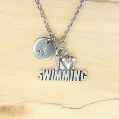 ♥ Swimming Necklace Silver I Love Swimming Charm Necklace Sport Gift Swimming Charms Swimming Gift Initial Necklace ♥ This is a beautiful I Love Swimming charm with hand stamped initial charm on a stainless steel chain, You able to choose initial from a drop down menu, ♥ You will receive 1 necklace ♥ I Love Swimming charm 15x22x2 mm ♥ Initial charm 10 mm choose from a drop down menu ♥ Stainless steel chain 18 inches ♥ additional initial https://www.etsy.com/listing/766732811 If you need help wit Personalized Metal Jewelry For Anniversary Gift, Personalized Letter Charm Necklaces, Personalized Silver Charm Necklace For Anniversary, Personalized Metal Jewelry For Birthday Gift, Valentine's Day Letter-shaped Engraved Jewelry, Silver Name Charm Necklace For Anniversary, Hand Stamped Charm Necklace For Valentine's Day, Valentine's Day Stainless Steel Nickel-free Charm Necklace, Personalized Metal Charm Necklaces For Valentine's Day