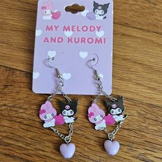 Sanrio My Melody & Kuromi Emo Kyun Statement Earrings Your Favorite Duo Is Ready To Add Some Sweetness To Your Look With These Sanrio Earrings! Featuring Dangling Charms Of My Melody And Kuromi And A Heart, These Hook Earrings Are Perfect For Your Outfits. Metal Approx. 2 3/4" Sanrio Matching Jewelry, Sanrio Earrings, Sanrio Jewelry, My Melody And Kuromi, Melody And Kuromi, Black Heart Earrings, Hello Kitty Earrings, Pink Heart Earrings, Goth Accessories