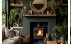 two pictures of a living room with a fire place in the center and potted plants on the far wall