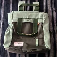 Brand New Doterra Backpack Zip Top - Water Bottle Holder On The Side. From A Clean, Smoke Free Home Sustainable Backpack, Backpack Essentials, Vegan Leather Backpack, Inspired Handbags, Gray Handbags, Versace Handbags, Purple Line, Water Bottle Holder, Water Bottle Holders