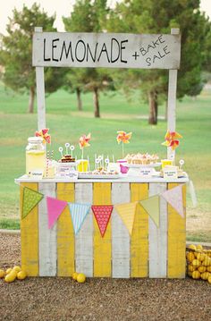 the lemonade stand is decorated with colorful candies