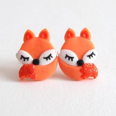 Those fox earrings are handmade with polymer clay by myself, they are completely adorable! Nice gift for anyone! - Earrings studs are stainless steel - Earrings measure 1,2 cm big - All jewelry will come packed in their own little organza bag I love to making custom orders! I'll work with you to make something completely unique and exactly how you want it; this includes shape, size and color that you adore. Let me know what you like and I'll do it.  Perfect for unique gifts, treats for yourself Earrings Kids, Fox Earrings, Fox Kids, Funny Earrings, Cake Stuff, Jewelry Cute, Polymer Clay Jewelry Diy, Orange Earrings, Cute Polymer Clay