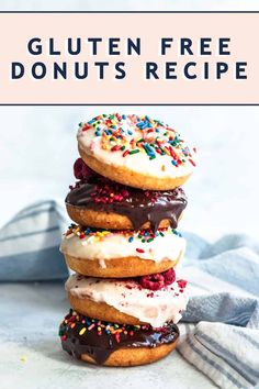 three donuts stacked on top of each other with chocolate frosting and sprinkles