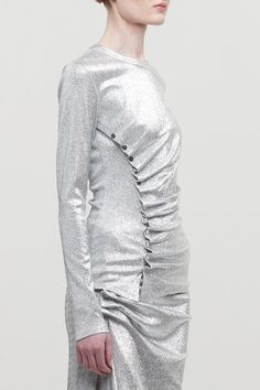 Silver lurex ruching with silver snap closures make up this stunning Rabanne Spring/Summer 2024 top, embodying the glamourous futurism of the brand. Charlotte Chesnais, Scarf Shirt, Shirts For Leggings, Pleats Please Issey Miyake, Cape Coat, Spring Summer 2024, Futurism, Paco Rabanne, Jean Leggings