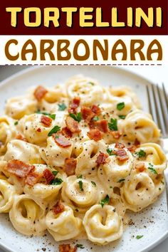 tortelli carbonara with bacon and parmesan cheese on a white plate