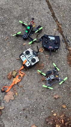 several remote controlled toys laying on the ground