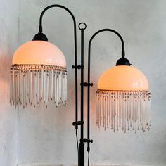 two lamps that are next to each other