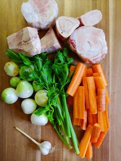 chopped vegetables and meat on a cutting board