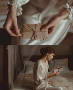 a woman in white dress sitting on bed holding a brown box with a string tied to it