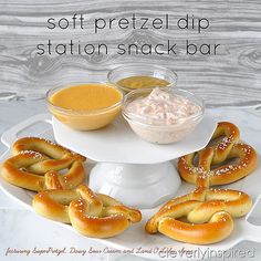 soft pretzel dip station snack bar on a white platter with bagels