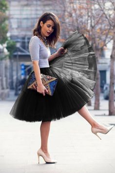 Q: What is the length? Does it come to the knee or is it more of a midi skirt?

The length for the skirt is 23.6", for a person who is 5'8 height, the skirt hits to knees

Q: Has anyone purchased this tutu for underneath a dress? If so did it look nice?

I purchased the tutus for women to go under a similar 1950s style dress. It works very well under it

Q: How many layers is the tulle skirt, is the skirt really fluffy ?

There are 6 layers tulle plus one layer of soft lining, so the skirt is re Tutu Women, Tutu Skirt Women, Womens Tulle Skirt, Tule Rok, Gonna In Tulle, 1950s Fashion Dresses, Tulle Tutu Skirt, Princess Skirt, Princess Tutu