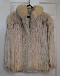 "Alan Furs of Richmond, Va. is one of America's first and finest furriers and is still operating today after 6 generations. Known for the highest quality furs, this blue (Arctic) fox fur coat is no exception. Beautifully designed with a wide collar, 3 pockets ( 1 interior breast), 2 handmade hook and eye closures and lined with champagne silk and gray leather. Part of an estate collection and purchased new by its only owner, this very warm and soft fur coat has been carefully stored and rarely w Arctic Fox, Fox Fur Coat, Gray Leather, Richmond Va, Refashion Clothes, Fox Fur, Grey Leather, Fur Coat, Fox