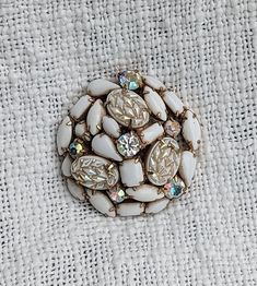 Gorgeous vintage Weiss milk glass and rhinestone large brooch with borealis colored stones.  Both vintage and modern style !  Ready to ship! White Party Brooches With Rhinestones, White Rhinestone Party Brooches, White Rhinestones Party Brooches, Vintage White Jewelry With Rhinestones, Rhinestone Shoes, Colored Stones, White Rhinestone, Black Necklace, Gold Tone Necklace