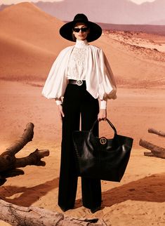 White shirt in poplin with puffy theatrical sleeves folding onto the shoulders, and mixed with black fabric trousers.

#TonyWard #FW24 #RTW #FallWinter #SafariSunset Special Occasion Dresses