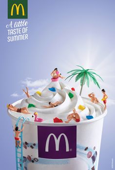 an advertisement for mcdonald's is shown with people on the beach in a large cup